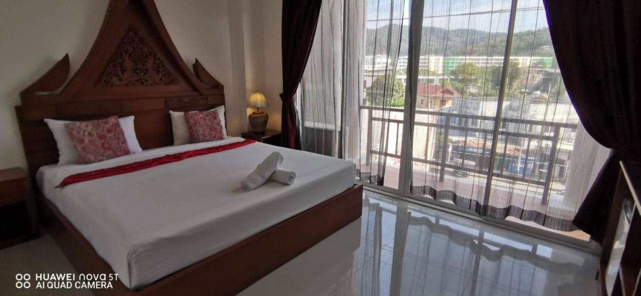 Sure Guesthouse Kamala Beach Exterior foto