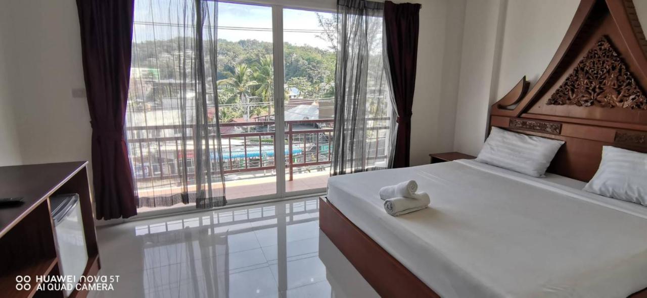 Sure Guesthouse Kamala Beach Exterior foto